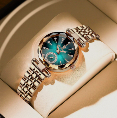 Luxury women’s watch with green dial and silver metal strap